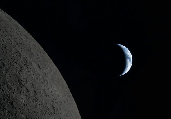 Crescent earth seen from the moon's surface
