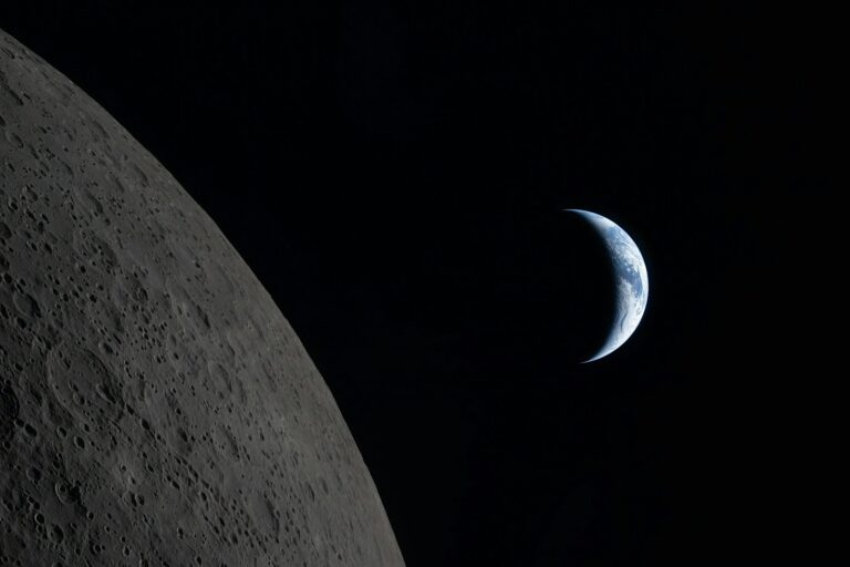 Crescent earth seen from the moon's surface