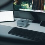 A desktop computer sitting on top of a white desk