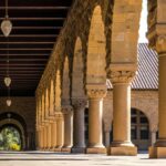 brown concrete hallways with columns